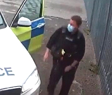 Policeman Pissing On CCTV
