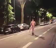 Naked Lad On A Scooter