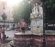 Rugby Team In A Fountain 