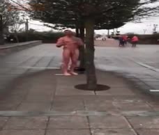 Naked Muscle Lad In The Street