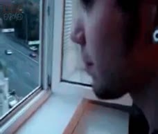Guy Pisses Out Of A Window