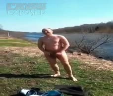 Bald Man On A River Bank 