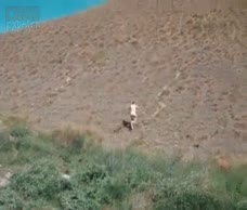 Naked Dude On A Hill