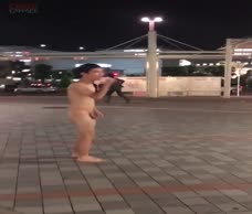 Chinese Man Walks Naked