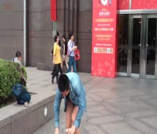 Asian Man Strips In The Street