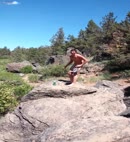Naked Lad On A Rock