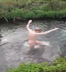 Naked Man In A River