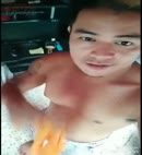 Asian Lad Does A Towel Dance