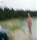 Naked Lad Dances At A Lake