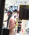 Lad In A Cap Goes Naked Shopping