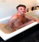 Naked Lad Takes A Bath