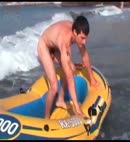 Naked Man In A Dinghy