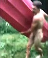 Naked Man In A Canoe