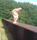 Naked Lad Jumps Off A Bridge