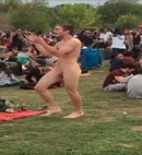 Naked Man At A Festival