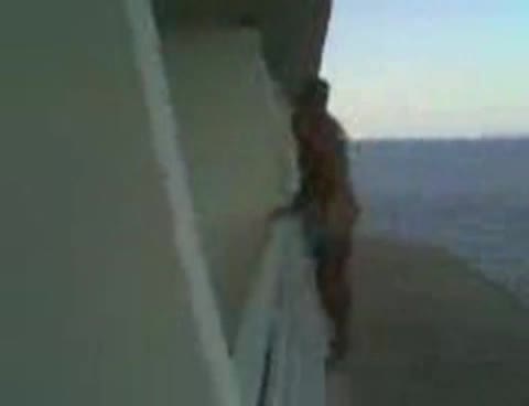 Naked Lad Climbs On A Balcony