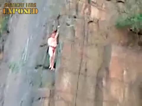 Naked Rock Climbing Lad