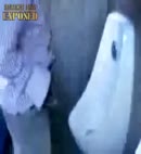 Lad At The Urinal