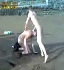 Naked Lads Wrestle At The Beach