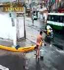 Naked Man Showers In The Street