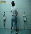 Pissing Lad At The Urinal