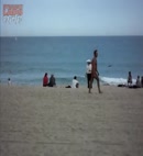 Naked Guy On The Beach In Barcelona
