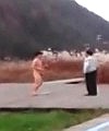 Police Officers Running Away From A Crazy Naked Guy