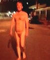 Blond Man Walking Naked In The Street