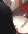 Buddy Pissing In A Sink