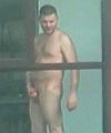 Naked Man On The Balcony 