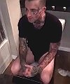Tattooed Lad In The Toilet