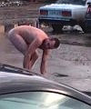 Strange Naked Russian On A Street