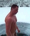 Russian Man Takes A Naked Ice Plunge