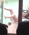 Naked Man Arrested In Shop