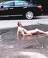 Naked Mad Russian In Puddle