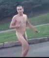 Strange Naked Man On A Road