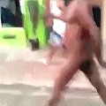 Naked Black Man Walks Down In The Street