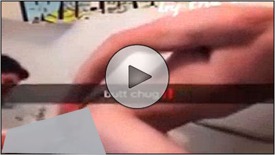 Naked man putting beer up his ass